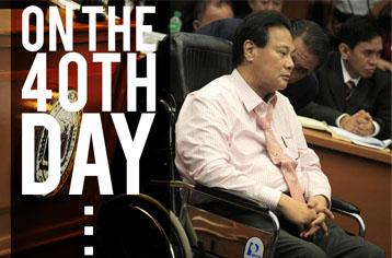 Chief Justice Renato Corona reappears in a wheelchair after leaving the Senate